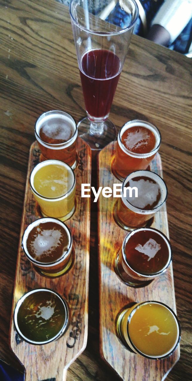 High angle view of beer served on table