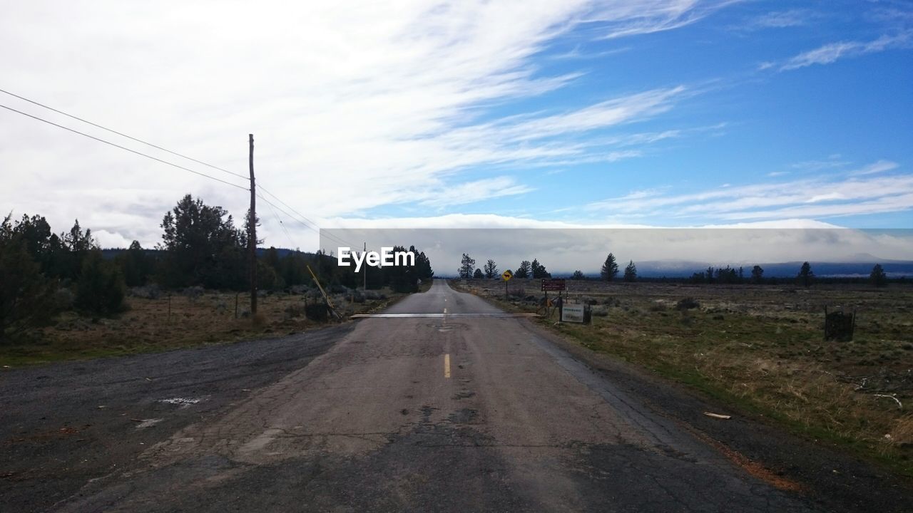 Road on landscape against sky