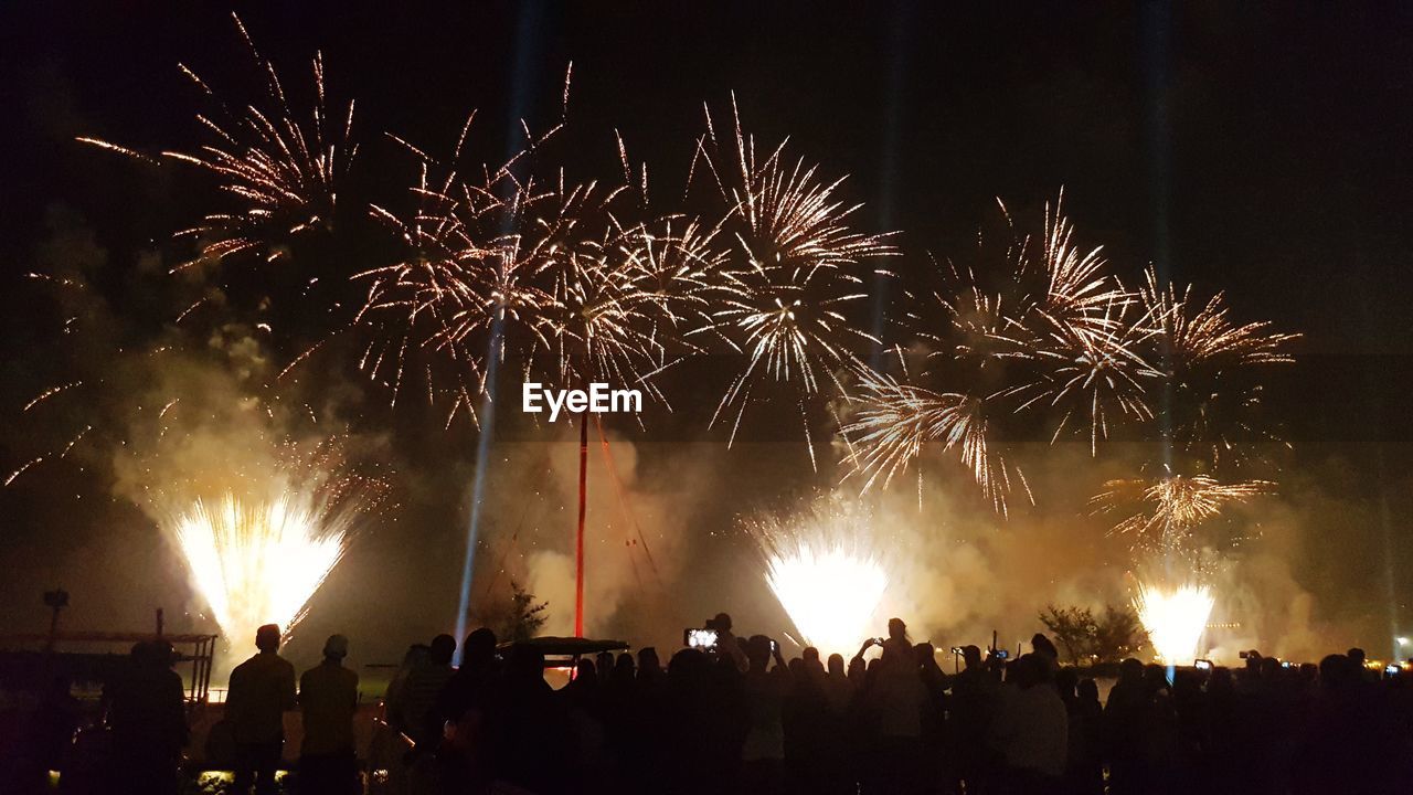 FIREWORK DISPLAY AT NIGHT DURING FESTIVAL
