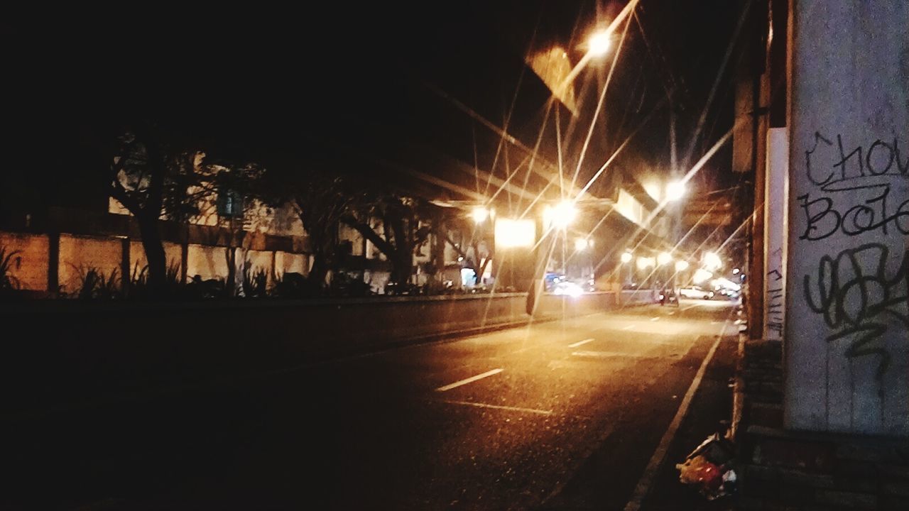 ROAD IN CITY AT NIGHT