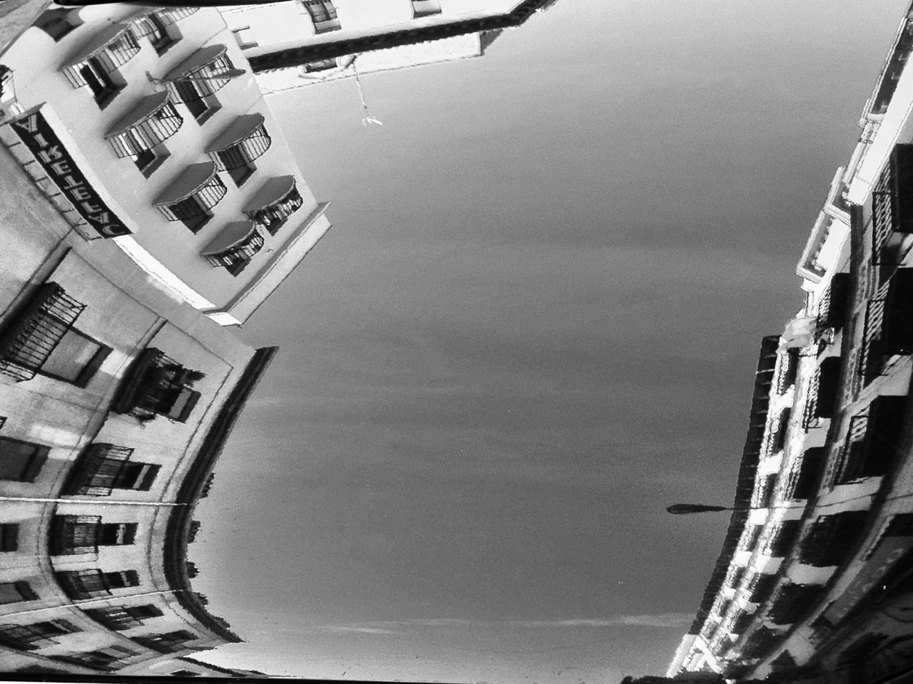 LOW ANGLE VIEW OF BUILDINGS AGAINST SKY