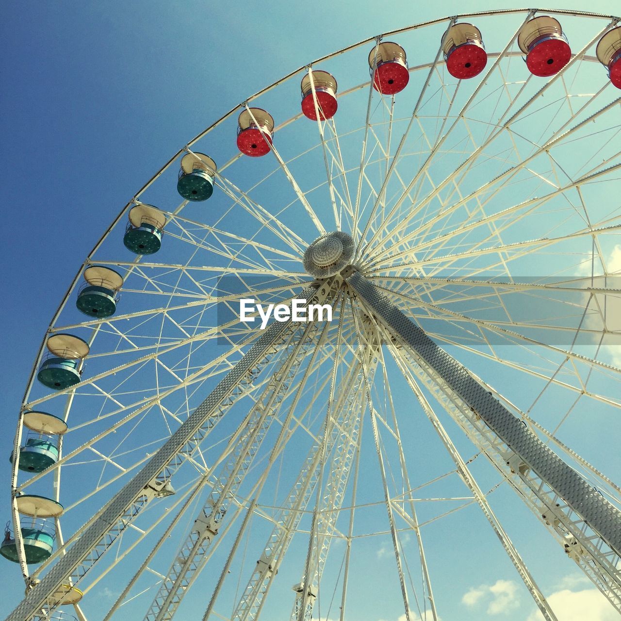 LOW ANGLE VIEW OF FERRIS WHEEL AT NIGHT