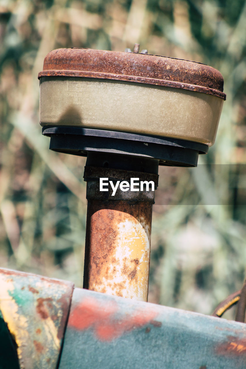 Close-up of old rusty machine part