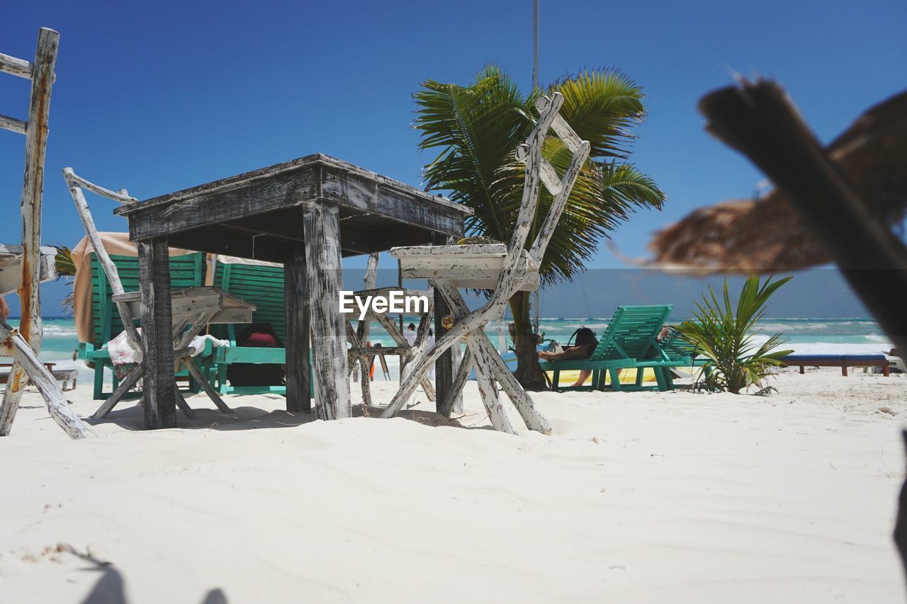 GAZEBO ON BEACH AGAINST CLEAR SKY