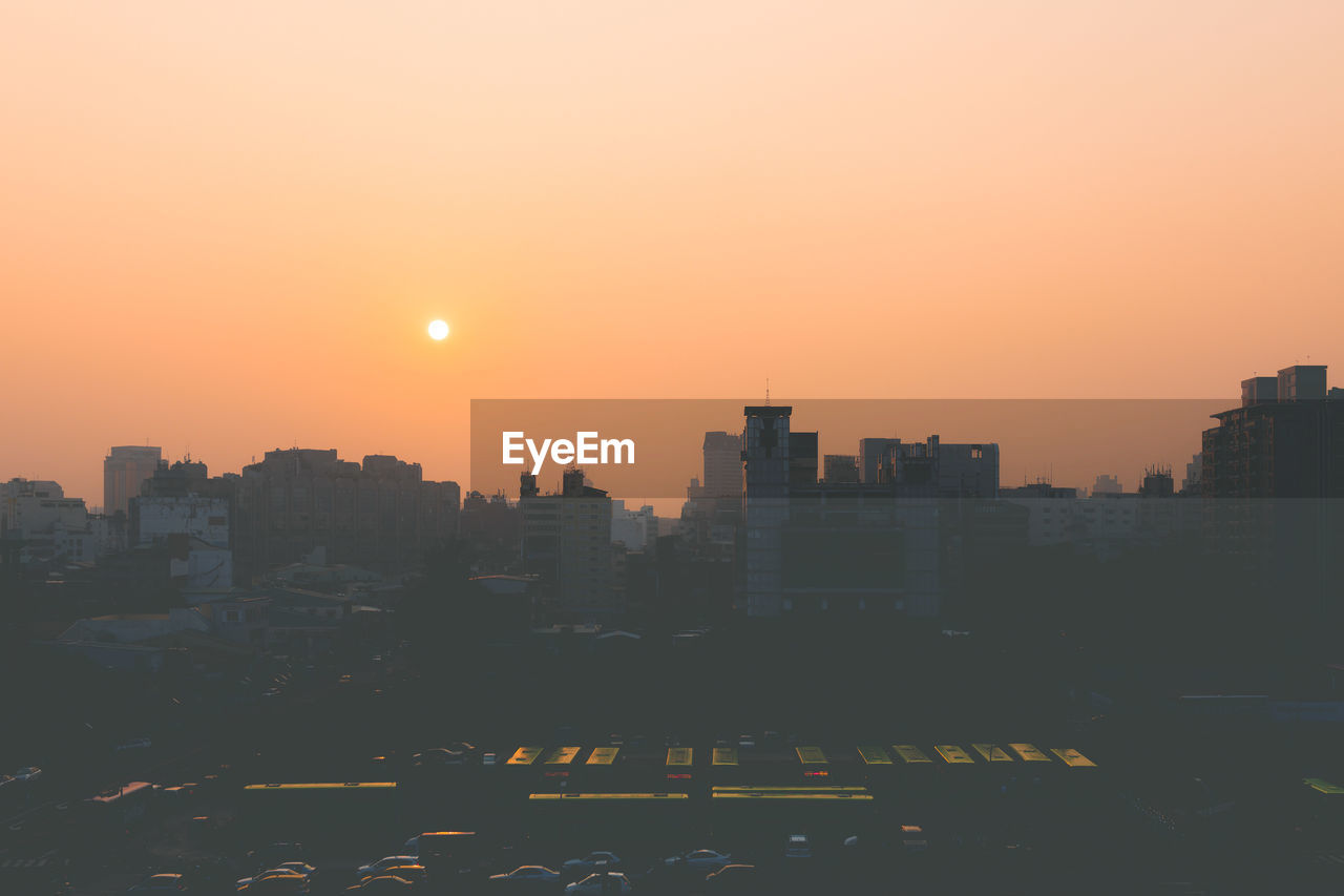 VIEW OF CITYSCAPE DURING SUNSET