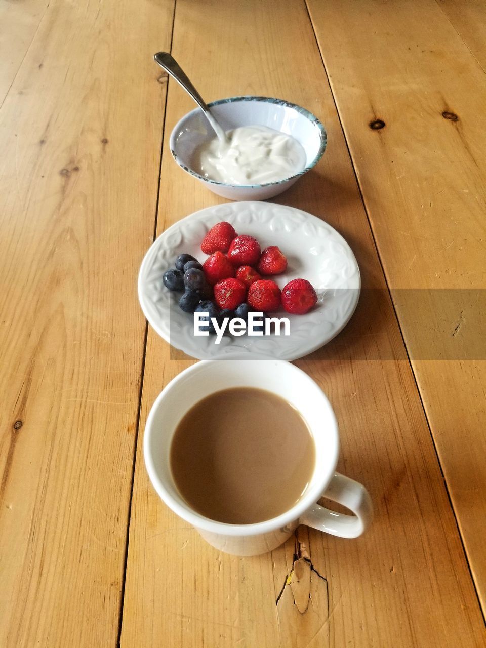 High angle view of coffee cup on table