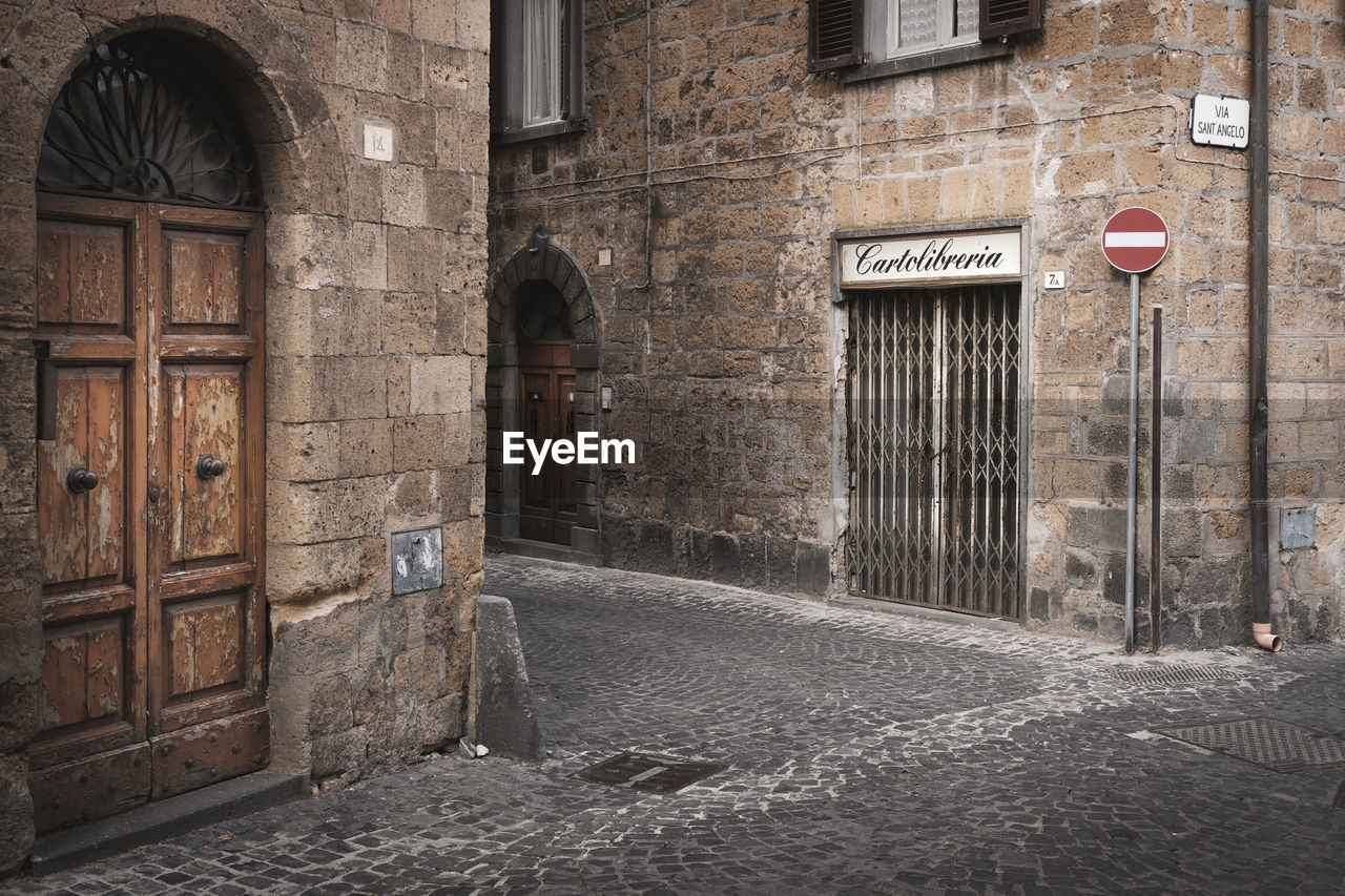 VIEW OF OLD BUILDING WITH CLOSED DOOR