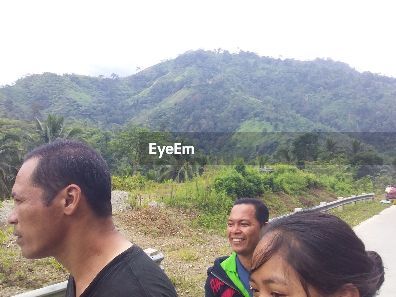 PORTRAIT OF MAN AND WOMAN ON MOUNTAIN