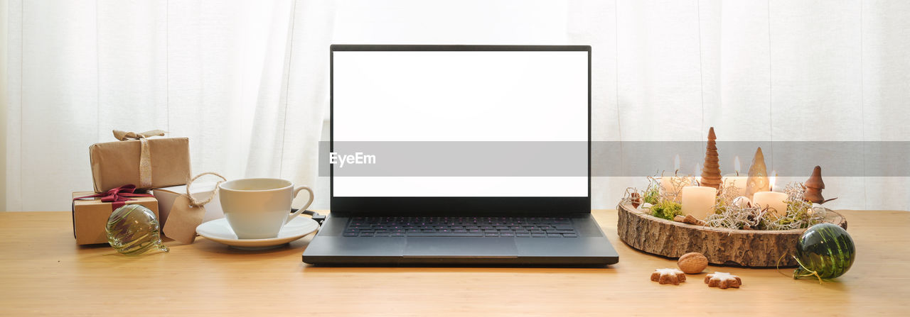 high angle view of laptop on table at home