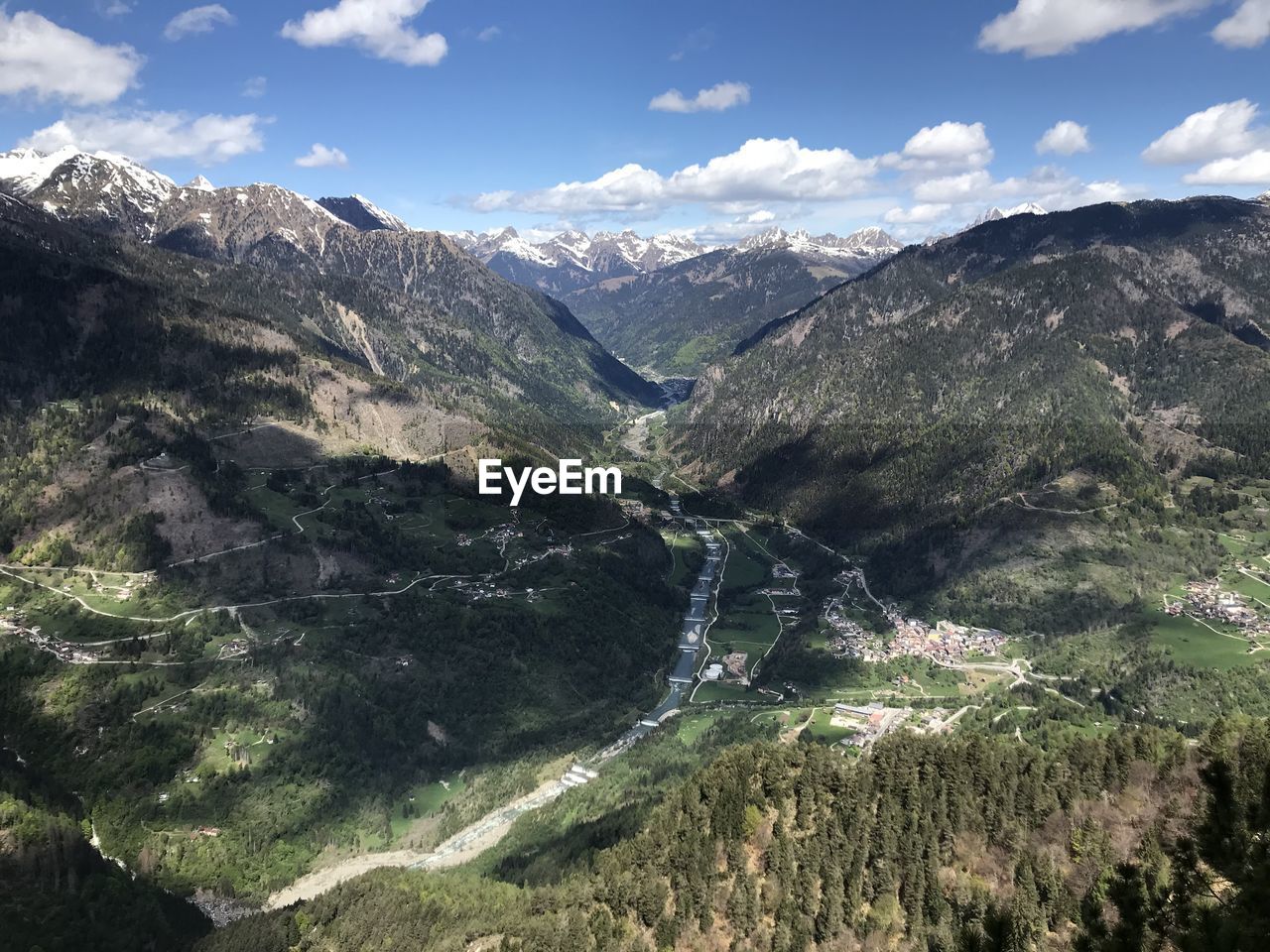 SCENIC VIEW OF VALLEY AGAINST SKY