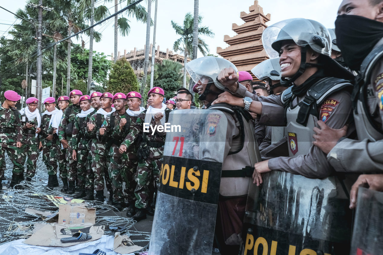 Rear view of police men