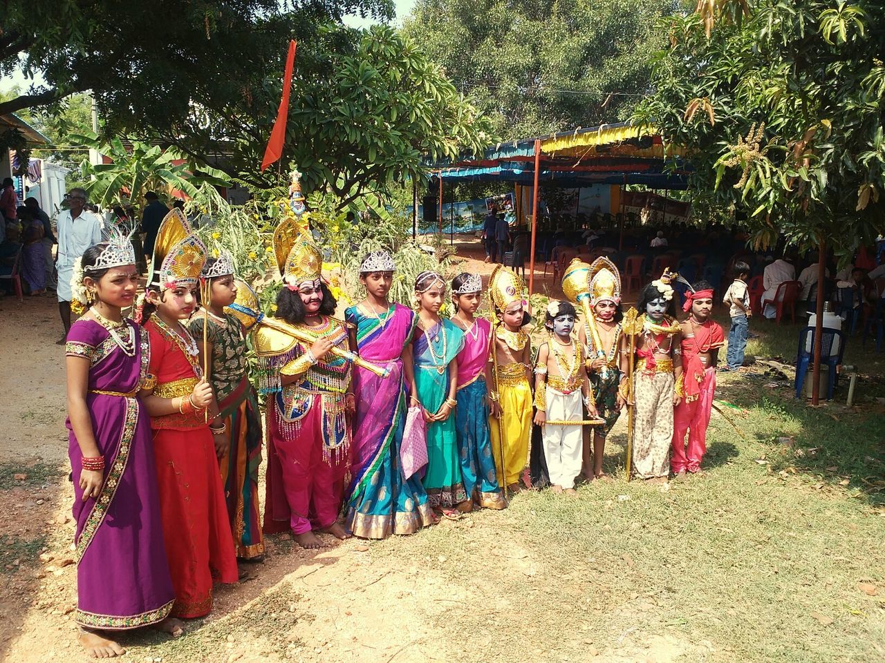 PANORAMIC VIEW OF PEOPLE IN TRADITIONAL CLOTHING