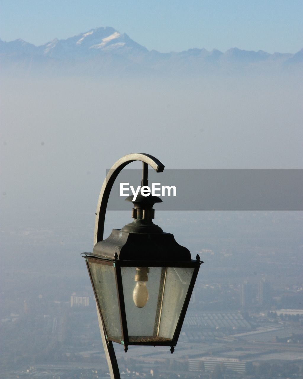 Lonely lamp with alp view