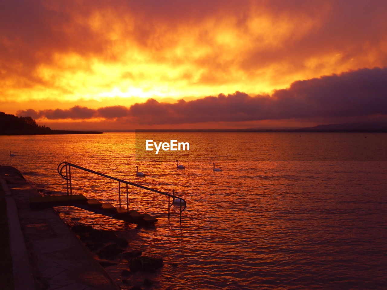 Scenic view of dramatic sky over sea