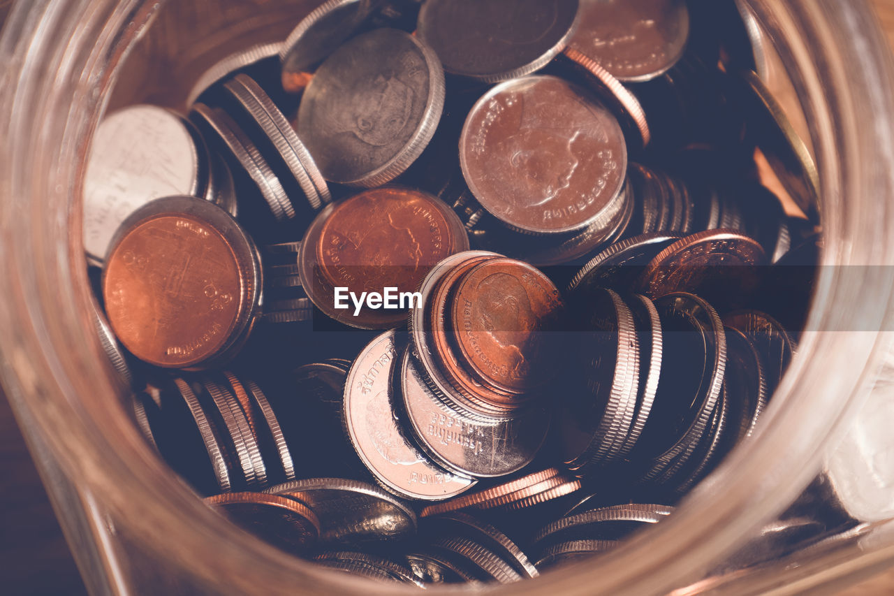 HIGH ANGLE VIEW OF COINS