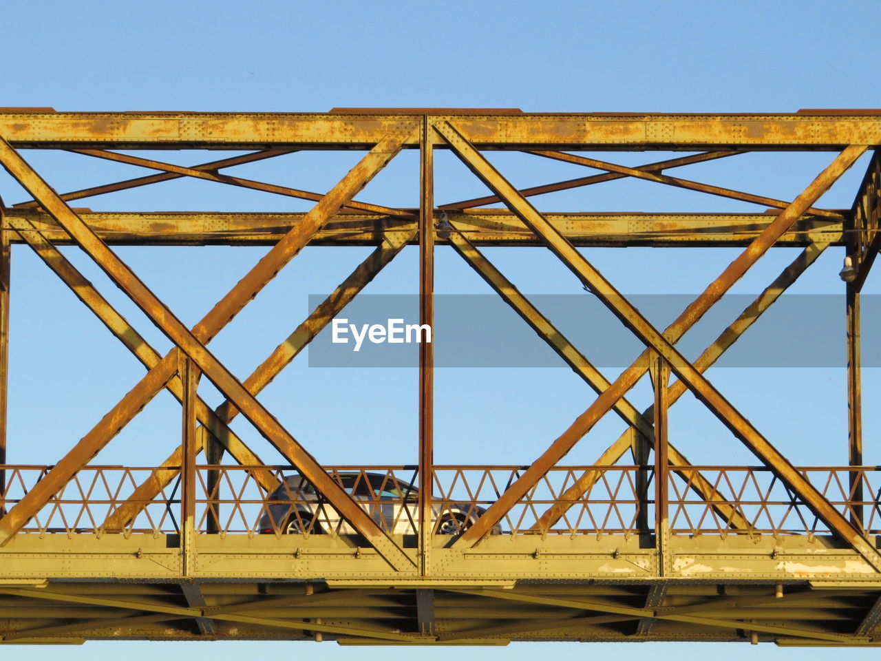 VIEW OF SUSPENSION BRIDGE AGAINST CLEAR SKY