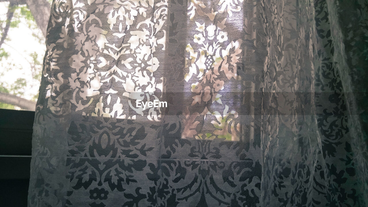 Floral pattern curtain at home