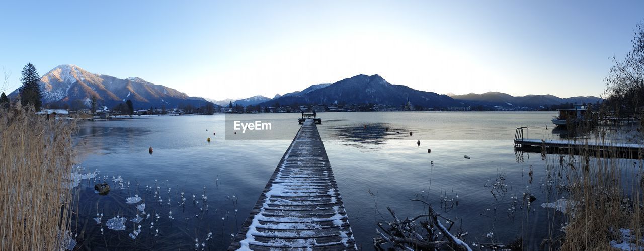 SCENIC VIEW OF LAKE AGAINST SKY DURING WINTER