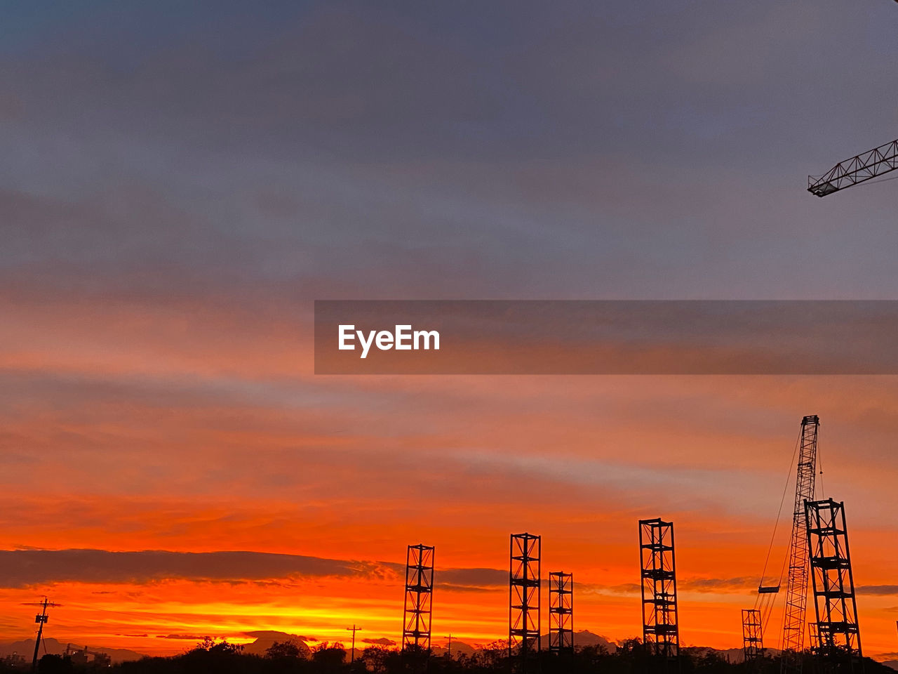 sky, sunset, technology, afterglow, cloud, orange color, silhouette, industry, evening, dusk, nature, power generation, no people, horizon, architecture, built structure, outdoors, electricity, beauty in nature, business finance and industry, dramatic sky, environment, tower, factory, machinery