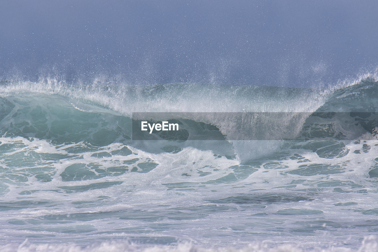 WATER SPLASHING IN SEA