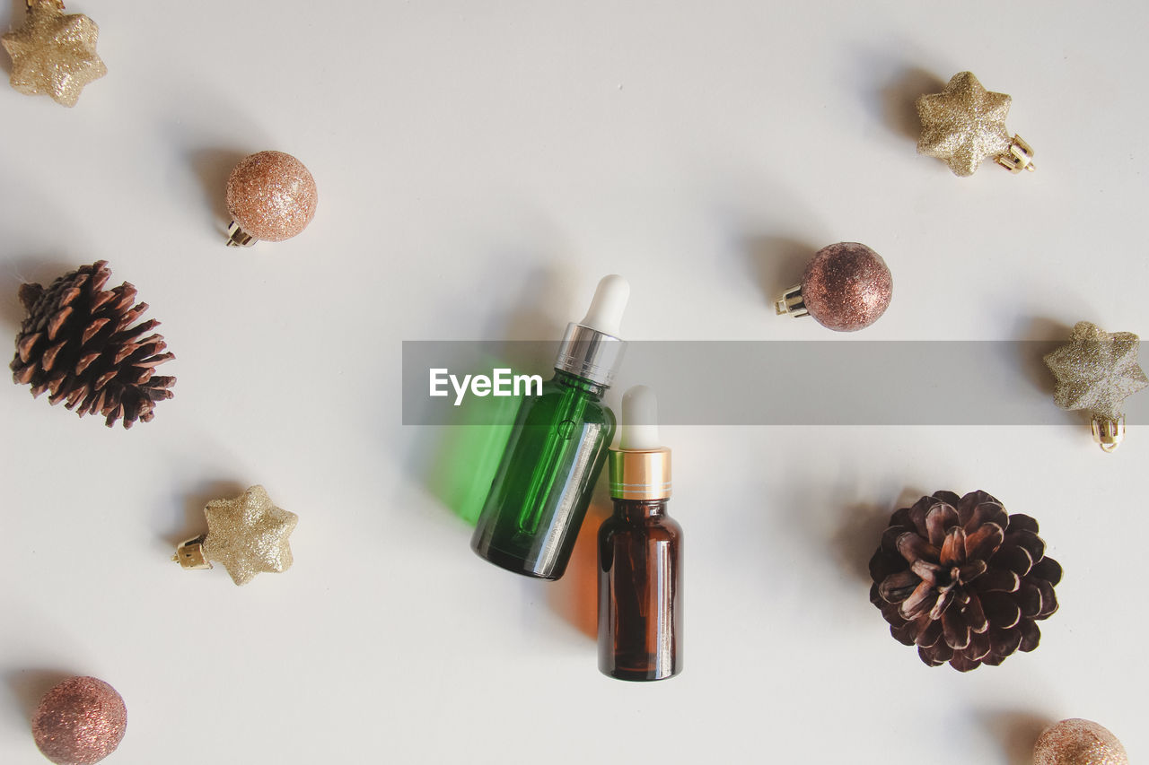 directly above shot of christmas decorations on white background