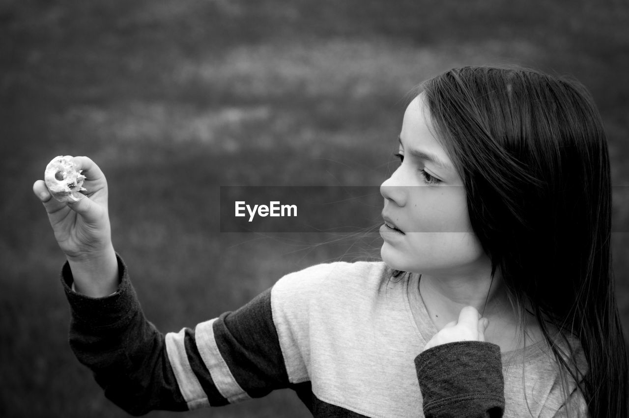 Close-up of girl looking at something