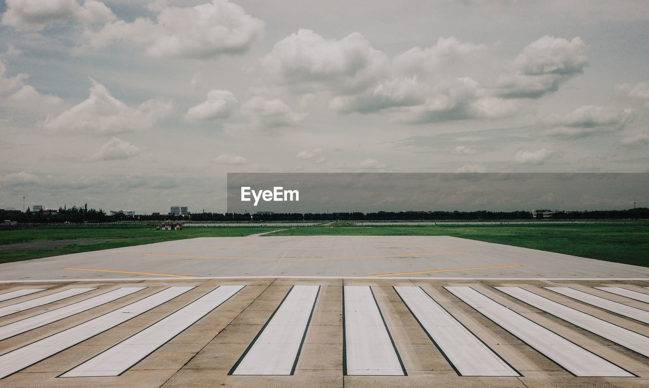 sky, cloud, horizon, nature, environment, no people, day, landscape, outdoors, airport runway, land, airport, travel, field, scenics - nature, architecture, overcast