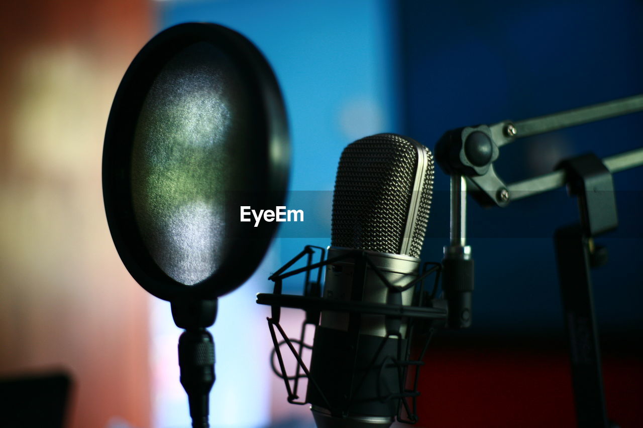 Close-up of microphone in recording studio