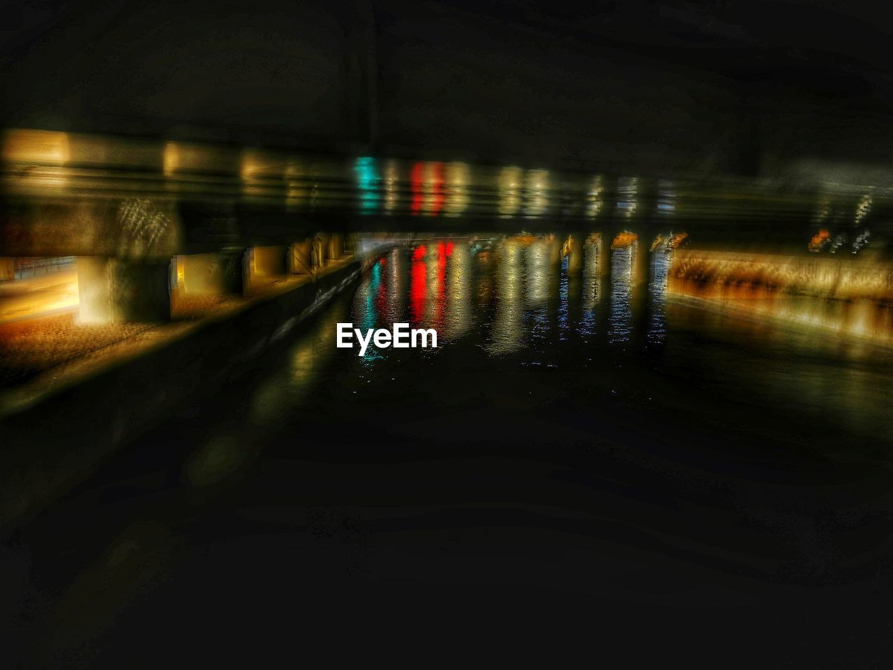 ILLUMINATED TRAIN AT NIGHT