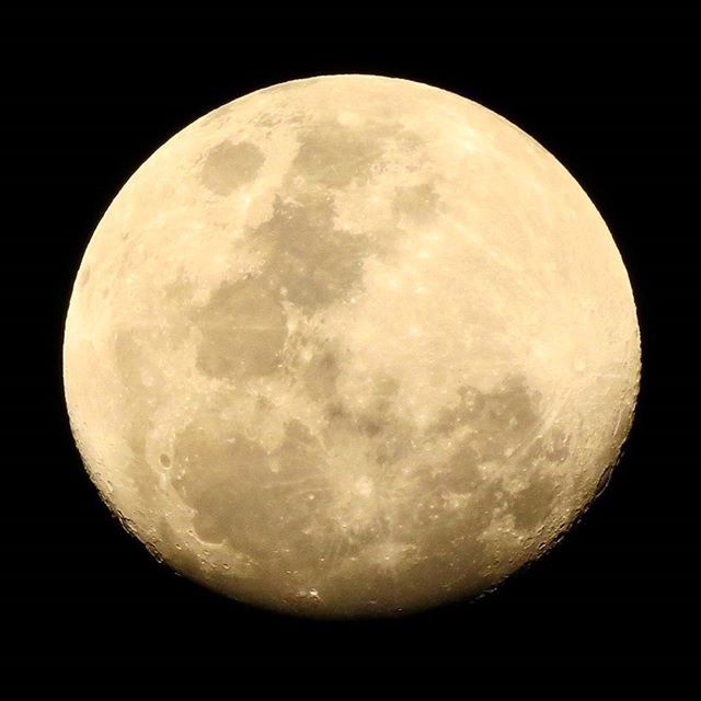 LOW ANGLE VIEW OF MOON IN SKY