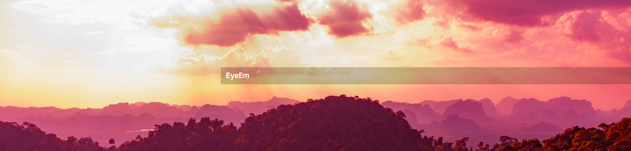 Panoramic view of mountains against sky during sunset