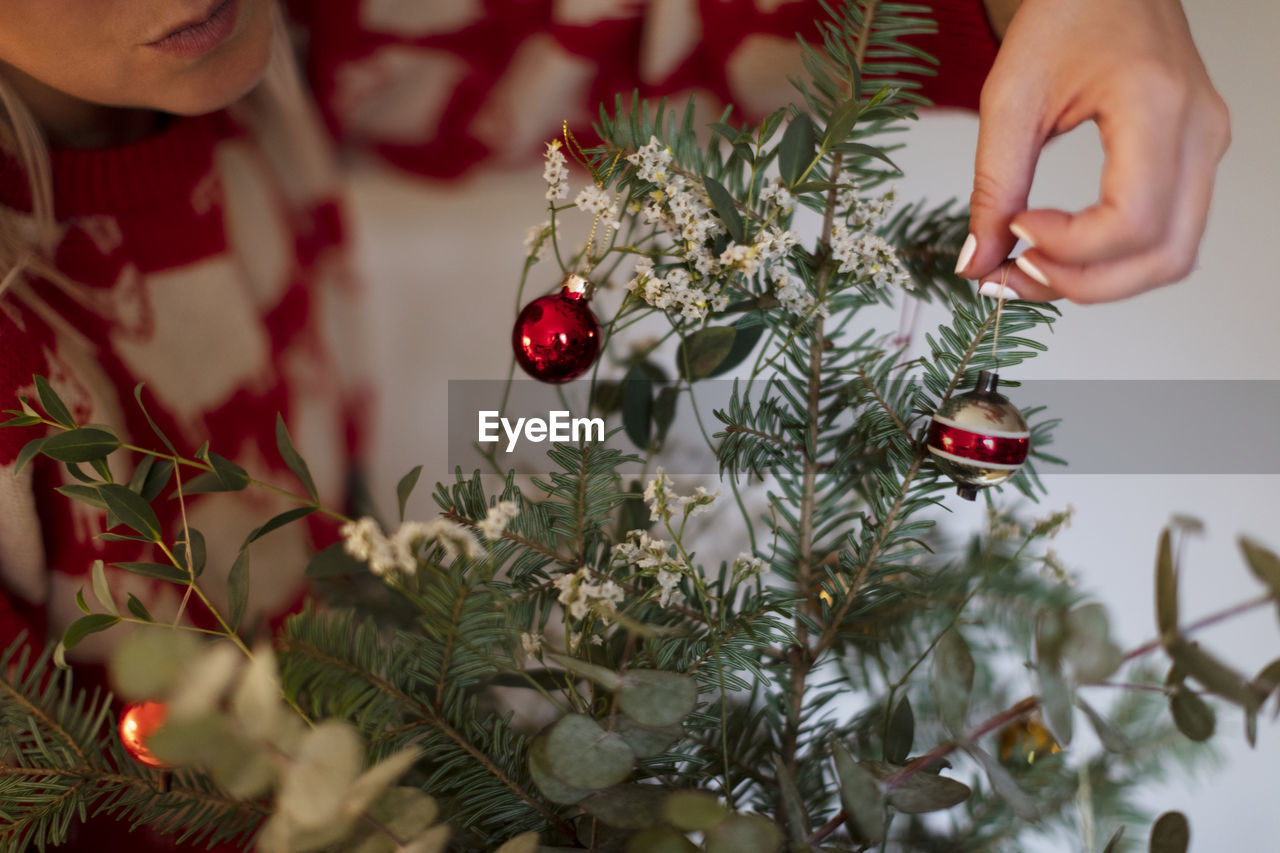 Hand holding christmas decoration