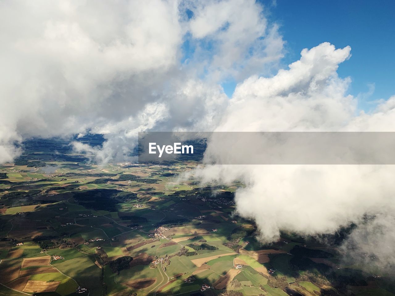 Aerial view of land against sky