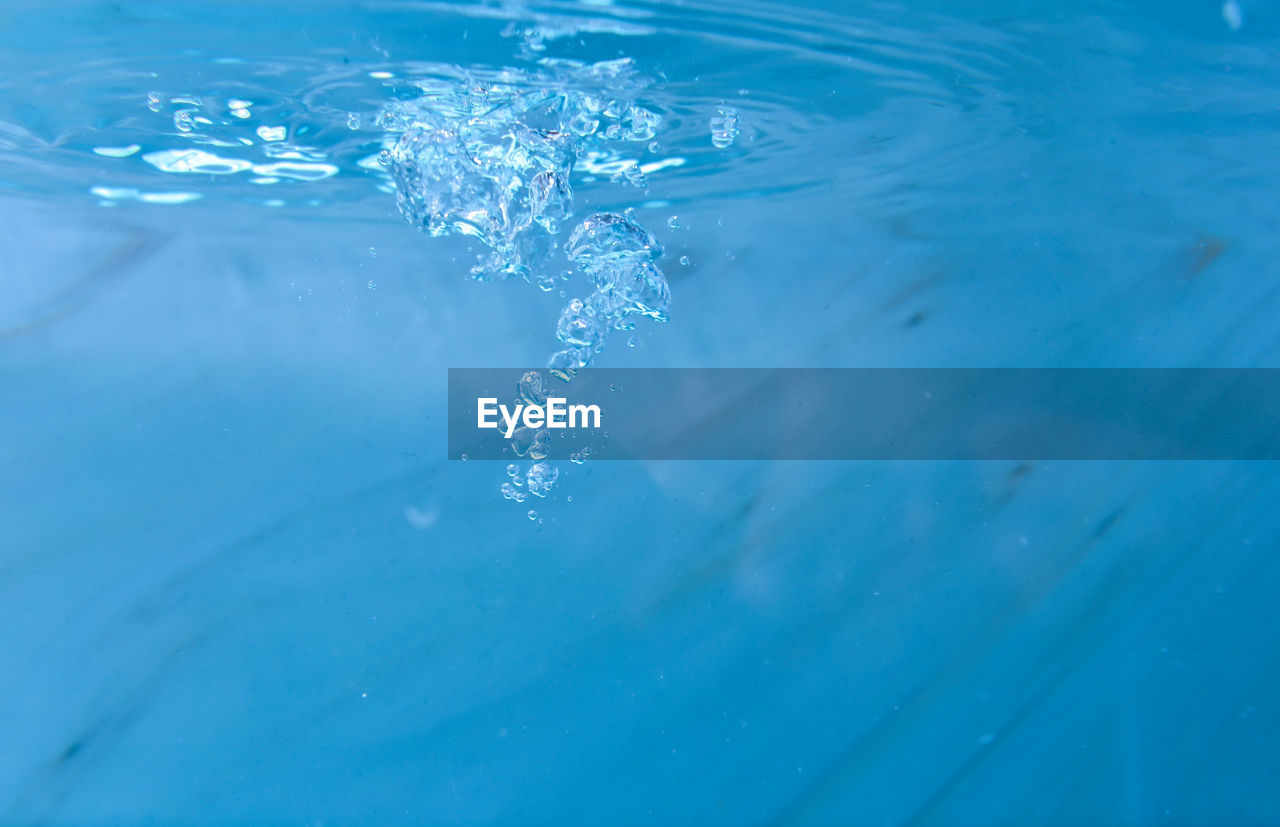 HIGH ANGLE VIEW OF SWIMMING POOL