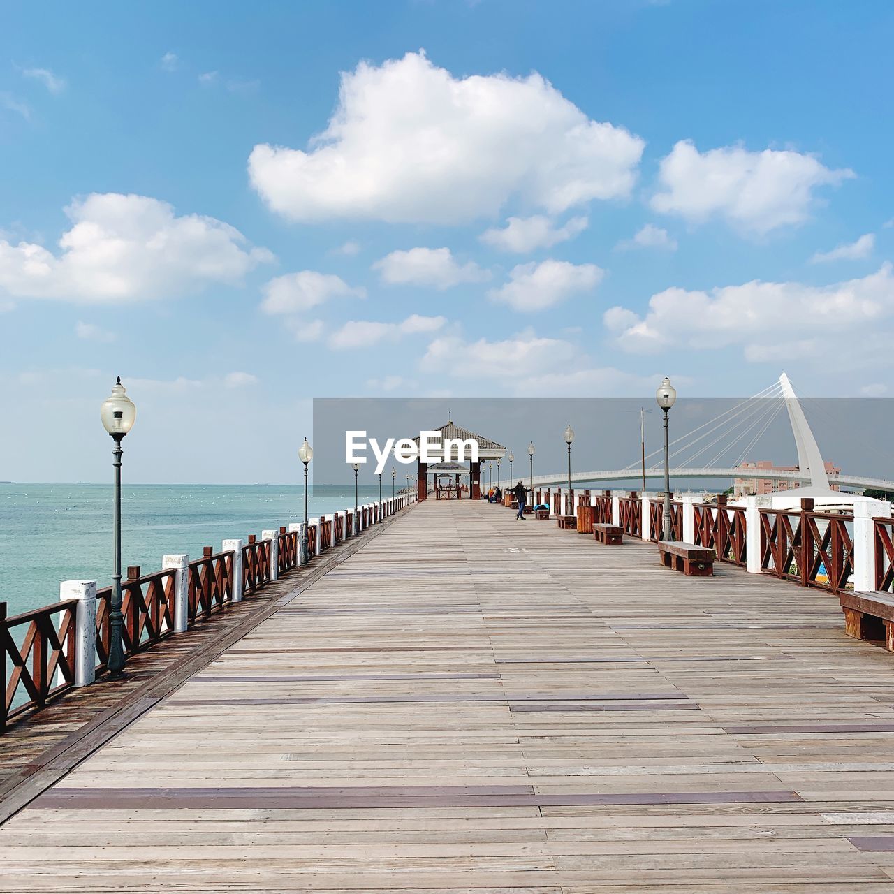 View of pier on sea against sky