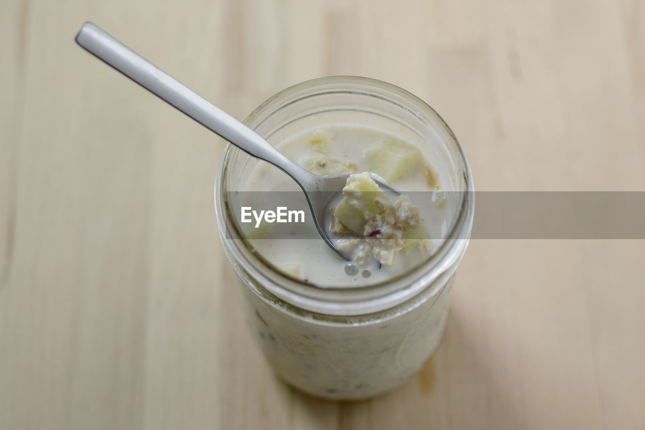 High angle view of oats in container on table