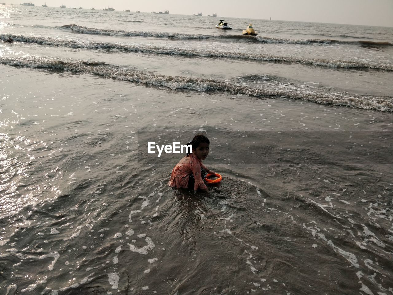 Girl swimming in sea