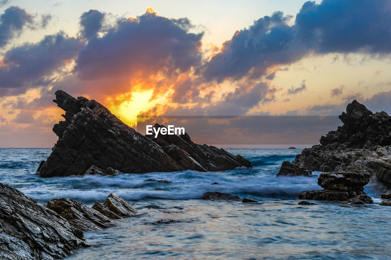 Scenic view of sea against sky during sunset