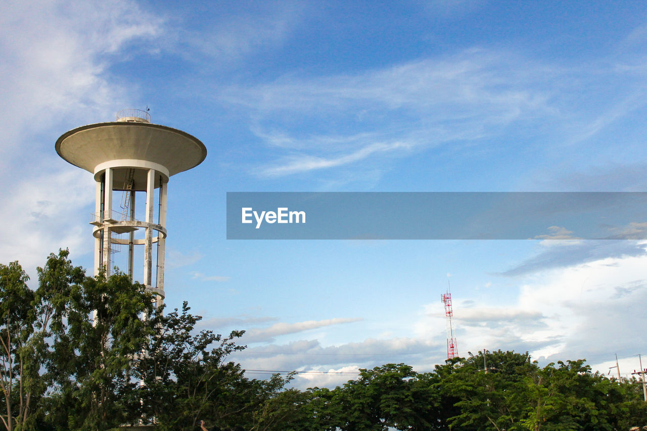 LOW ANGLE VIEW OF WATER TOWER ON CLOUDY DAY