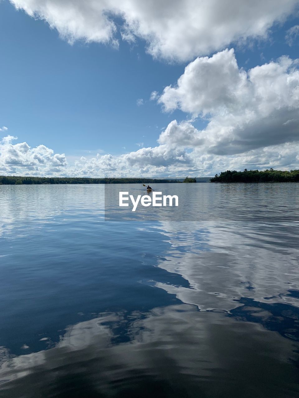 VIEW OF SWIMMING IN LAKE