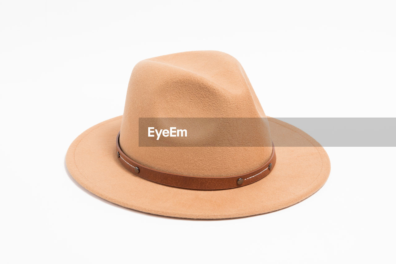 hat, clothing, cut out, brown, beige, fashion accessory, white background, cowboy hat, no people, sun hat, fedora, indoors, single object, studio shot, headgear, cap