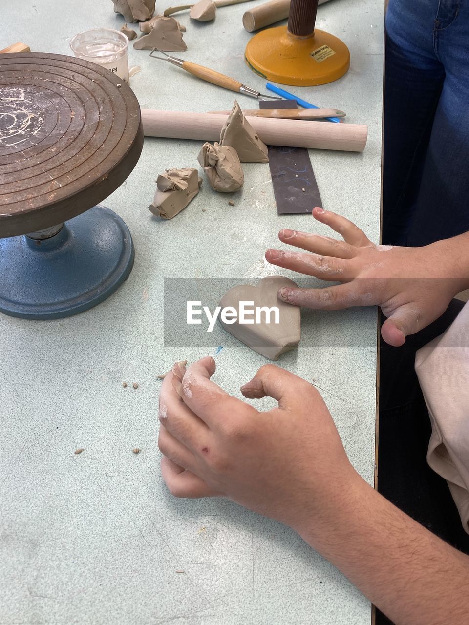 hand, indoors, one person, adult, high angle view, occupation, working, men, skill, craft, table, creativity, wood, work tool, workshop, making