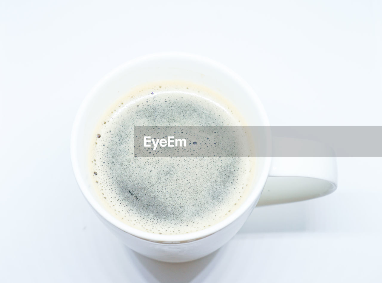 High angle view of coffee on white background