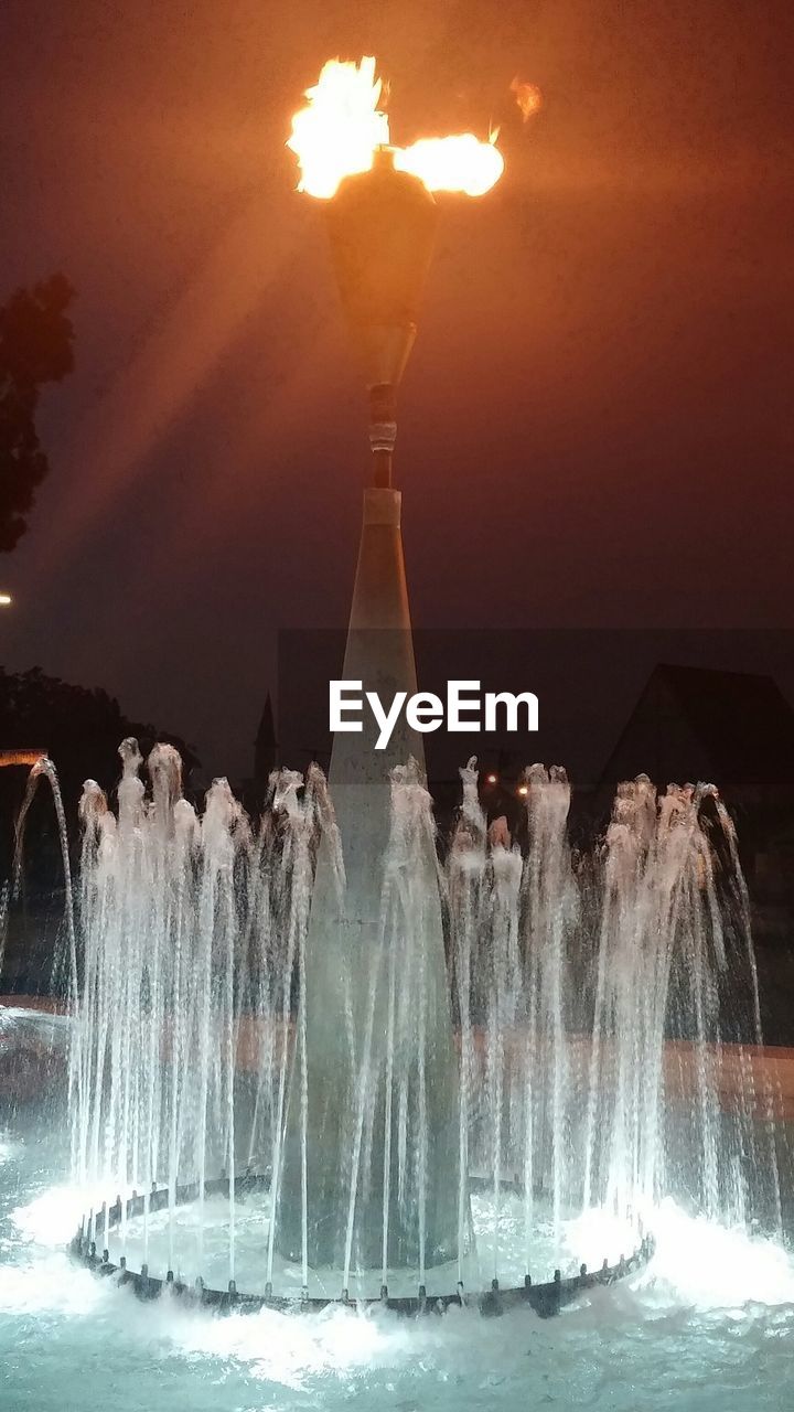 VIEW OF ILLUMINATED FOUNTAIN