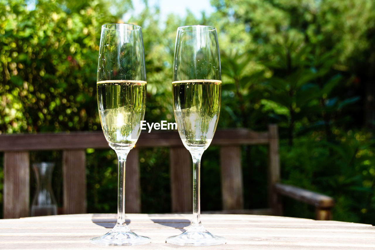 Champagne flutes on table