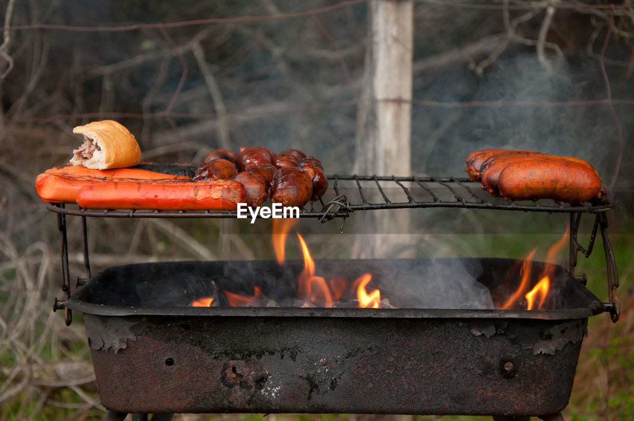 Close-up of bonfire on barbecue grill