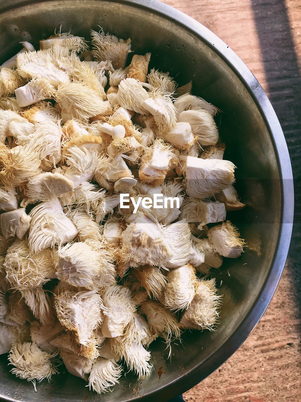 High angle view of mushrooms in bowl on table