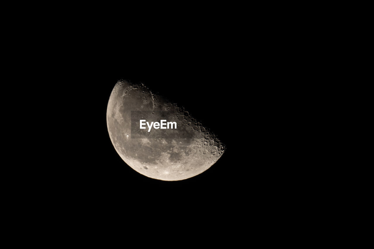 LOW ANGLE VIEW OF MOON AGAINST SKY