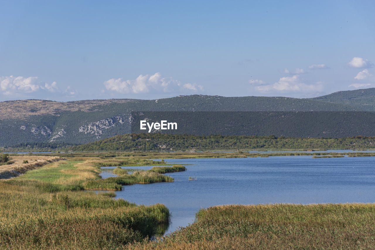 Scenic view of lake against sky