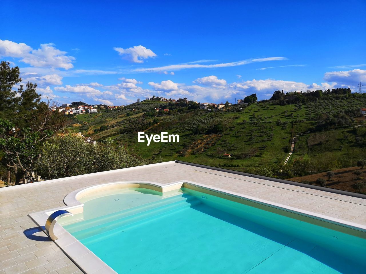 VIEW OF SWIMMING POOL AGAINST SKY